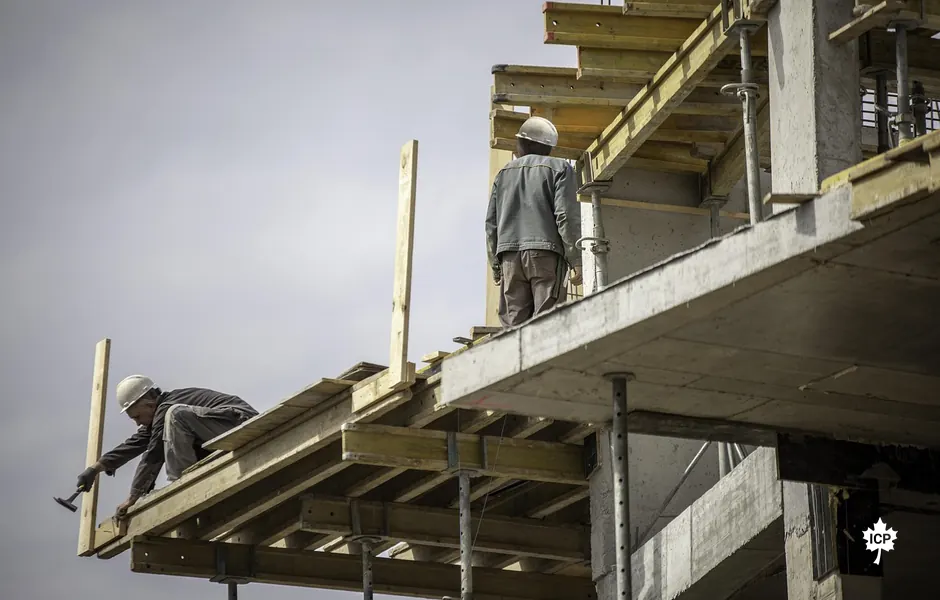 Construction workers on a building